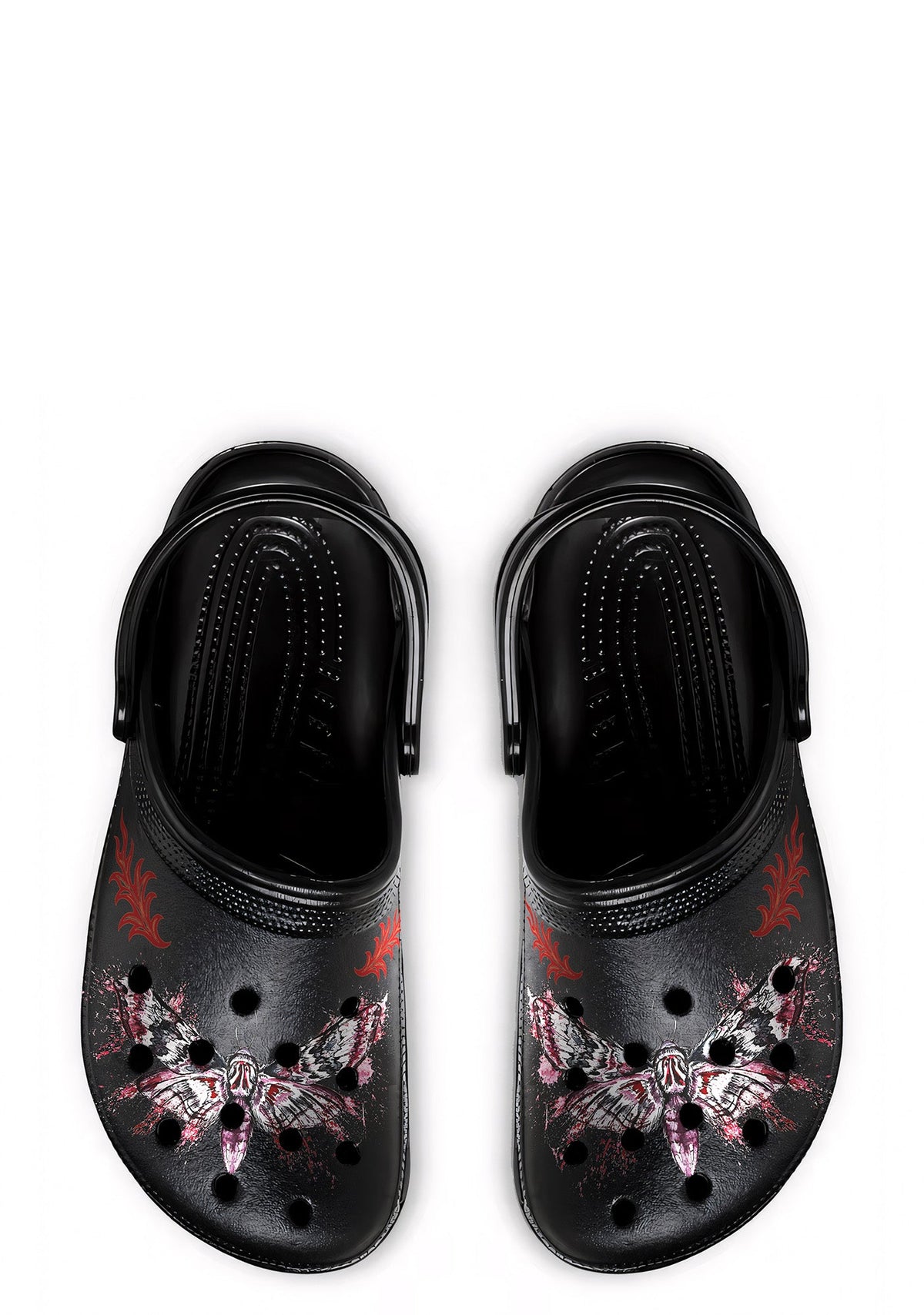 Top-down view of black gothic slippers with mirrored tattoo moth prints and red flame graphics