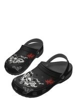 Angled view of black Whispers In Bloom Slippers with adjustable back strap and tattoo design