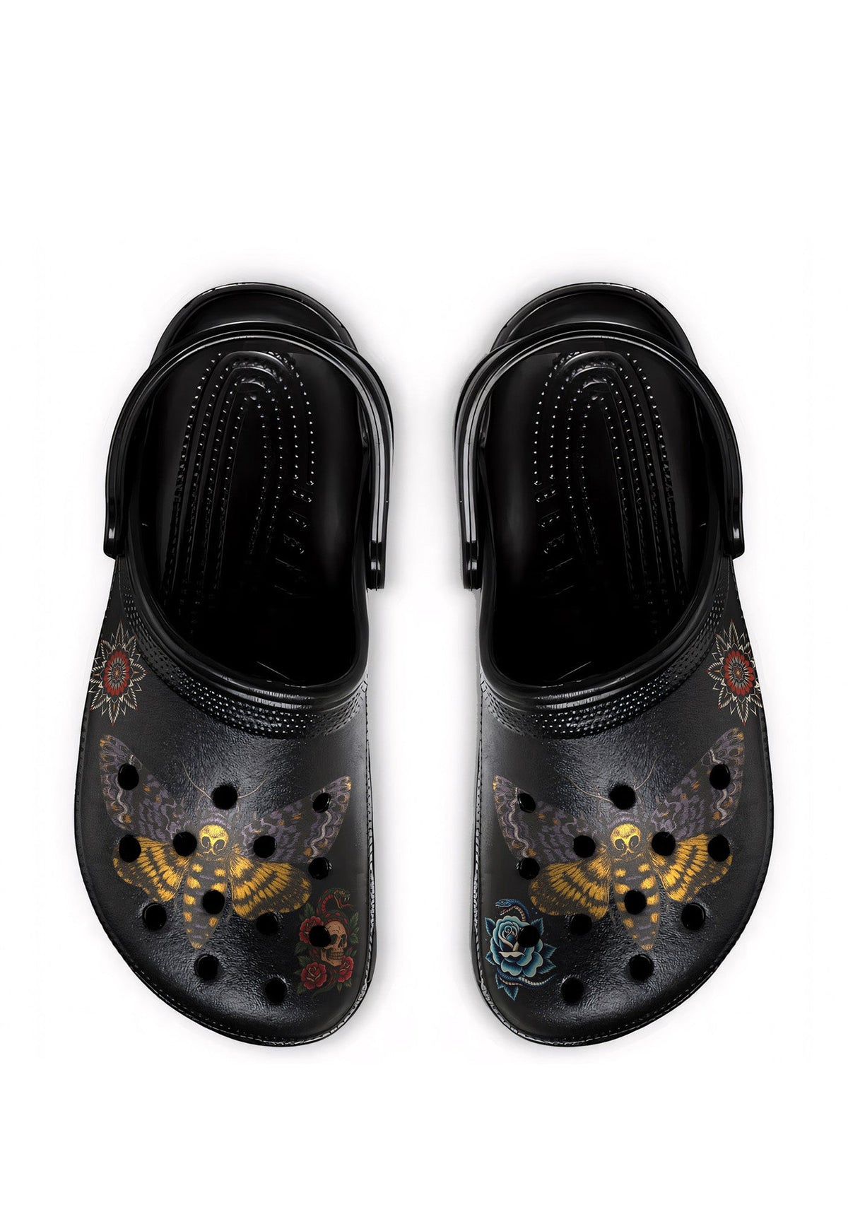 Black gothic slides with death moths, roses, and skulls, viewed from above