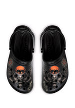Black gothic slippers featuring a death moth and orange skull eclipse with vintage tattoo flowers