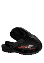Sole view of comfy gothic clogs with black tread
