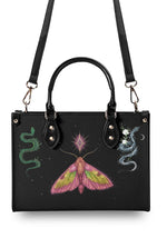 Mystic Moth and Serpent Handbag with detachable shoulder strap and front magical print, showing gothic celestial vibe