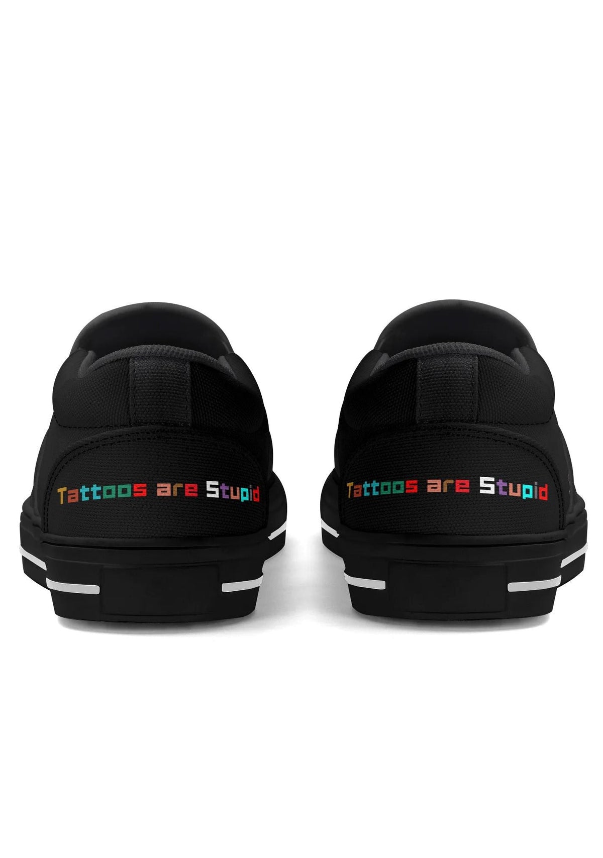 Back view of black slip-ons with rainbow “Tattoos are Stupid” text across both heels