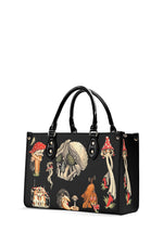 Side view of gothic mushroom print PU leather handbag