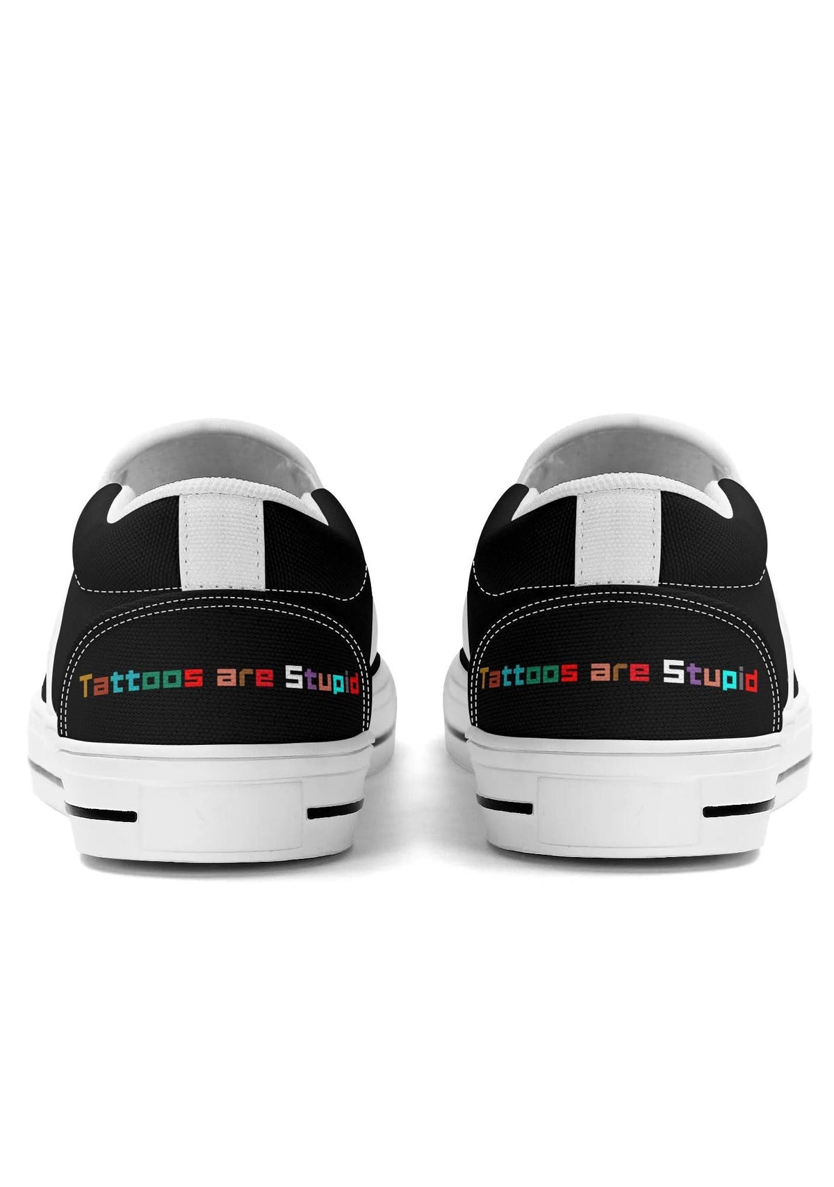 Rear view of white-trimmed slip-ons with colorful “Tattoos are Stupid” slogan on both heels