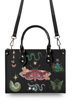 Black gothic tote with detachable shoulder strap and magical insect print