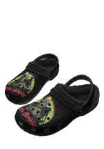 Angled black horror slippers featuring green zombie and red text