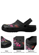 Side detail of black clogs highlighting print, holes, and comfort features