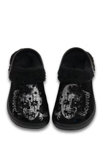 Front view of black gothic slippers with white metal pinhead graphic