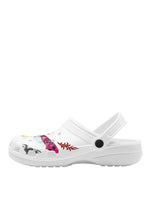 Side view of white slippers with bold tattoo-style insect graphic