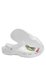 Underside of white zombie print slippers with horror text