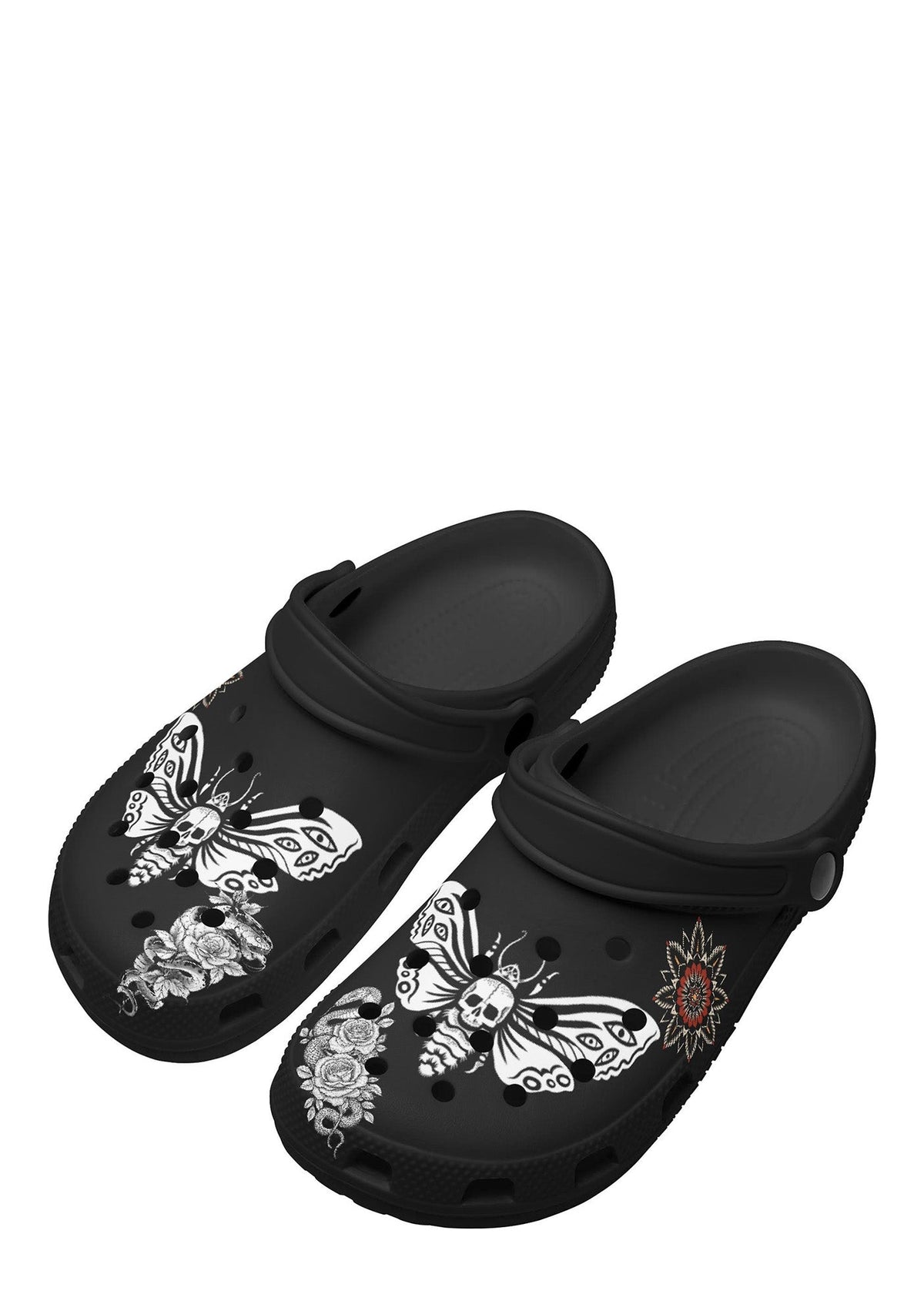 Angled view of black slip-ons featuring skull moths and floral tattoo graphics