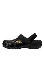 Outer side of fleece slippers featuring golden death moth and flame tattoo