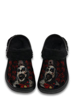 Front view of fuzzy black slippers with horror clown and red HA graffiti