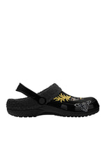 Inner view of gothic slippers with skull-wing moth design