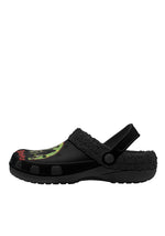 Side view of black slippers with fleece lining and undead design