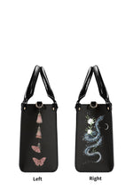 Left side with pink moths and tassels, right side with snake and white flower under crescent moon
