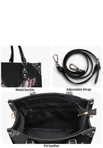 close-up of metal hardware, adjustable strap, and PU leather finish of the tattoo moth handbag
